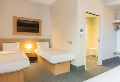 Un ou plusieurs lits dans un hébergement de l'établissement B&B HOTEL Limoges Centre Gare
