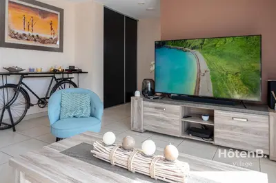 Télévision ou salle de divertissement dans l'établissement 