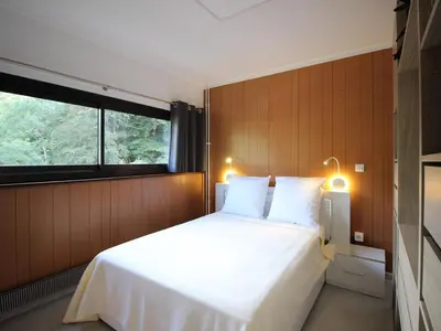 Un ou plusieurs lits dans un hébergement de l'établissement Bel appartement 2 pièces Mont-Dore, Wifi, parking, 4 pers - FR-1-608-253