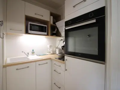 Cuisine ou kitchenette dans l'établissement Bel appartement 2 pièces Mont-Dore, Wifi, parking, 4 pers - FR-1-608-253