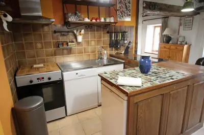 Cuisine ou kitchenette dans l'établissement Le chat qui peche