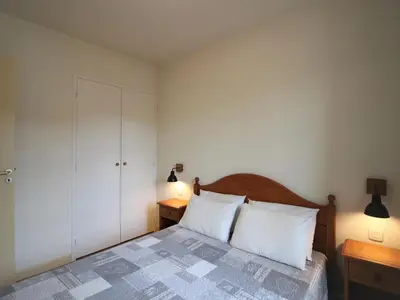 Un ou plusieurs lits dans un hébergement de l'établissement Appartement T2 bis à La Bourboule, animaux admis, parking, Wifi - FR-1-608-254