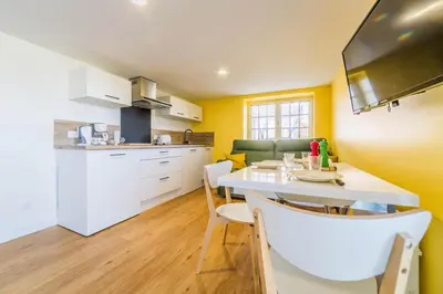 Cuisine ou kitchenette dans l'établissement Les chevrefeuilles Appartement en residence