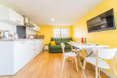 Cuisine ou kitchenette dans l'établissement Les chevrefeuilles Appartement en residence