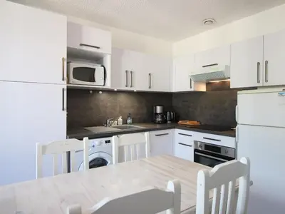 Cuisine ou kitchenette dans l'établissement T3 2 étoiles avec wifi, à 300m des thermes - FR-1-608-255