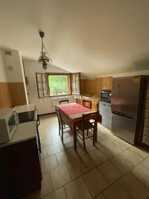 Cuisine ou kitchenette dans l'établissement Chez Patrick