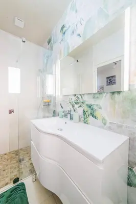 Salle de bains dans l'établissement Les Rosiers - Maison avec JACUZZI