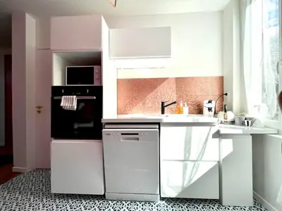Cuisine ou kitchenette dans l'établissement Maison Yuki - Rose Velours - Netflix & Parking