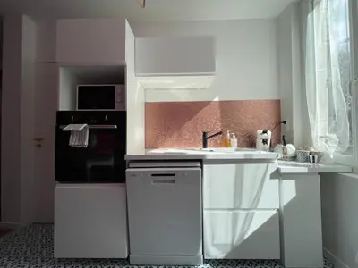 Cuisine ou kitchenette dans l'établissement Maison Yuki - Rose Velours - Netflix & Parking