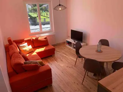 Coin salon dans l'établissement Maison familiale 80m2 3 chambres