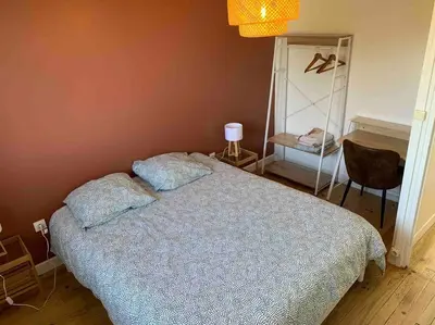 Un ou plusieurs lits dans un hébergement de l'établissement Maison familiale 80m2 3 chambres