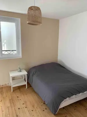 Un ou plusieurs lits dans un hébergement de l'établissement Maison familiale 80m2 3 chambres