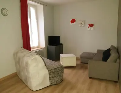 Coin salon dans l'établissement Appart résidence Le Dordogne