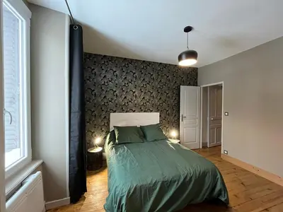 Un ou plusieurs lits dans un hébergement de l'établissement Appartement 8 pers, centre Mont-Dore, WIFI - FR-1-608-256