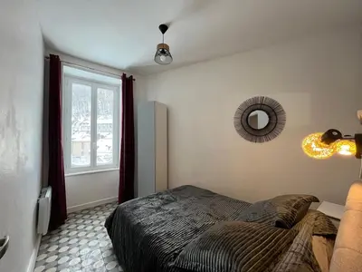 Un ou plusieurs lits dans un hébergement de l'établissement Appartement 8 pers, centre Mont-Dore, WIFI - FR-1-608-256