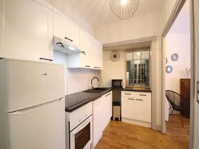 Cuisine ou kitchenette dans l'établissement Appartement 8 pers, centre Mont-Dore, WIFI - FR-1-608-256