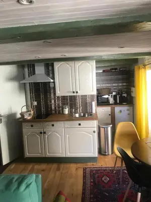 Cuisine ou kitchenette dans l'établissement Le grenier