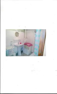 Salle de bains dans l'établissement LA TOUR D'AUVERGNE