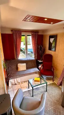 Coin salon dans l'établissement Maison Le Barbier 10pers Le Mont Dore