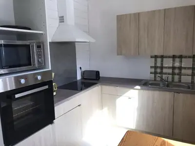 Cuisine ou kitchenette dans l'établissement appartement 6 places station super besse