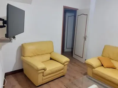 Coin salon dans l'établissement Gite au cœur du village du Périgord noir