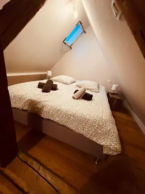 Un ou plusieurs lits dans un hébergement de l'établissement Maison Albuconis, 3 chambres 150m2 avec piscine en centre ville