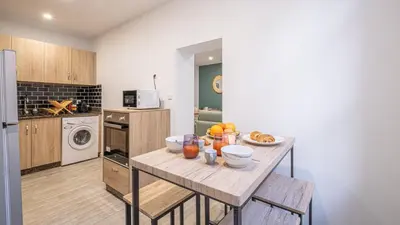 Cuisine ou kitchenette dans l'établissement Le Vertuose - Welc'Home