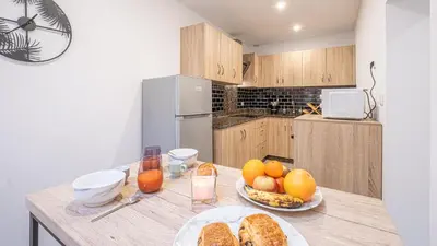Cuisine ou kitchenette dans l'établissement Le Vertuose - Welc'Home