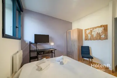 Télévision ou salle de divertissement dans l'établissement Spacious Cocoon with AC and PARKING At the Heart of Feytiat Limoges
