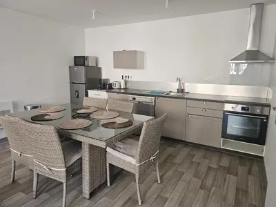 Cuisine ou kitchenette dans l'établissement Logement centre ville