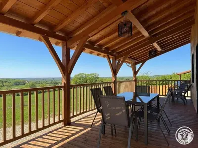 Balcon ou terrasse dans l'établissement Maison moderne au cœur du Périgord Vert avec animaux admis - FR-1-616-337