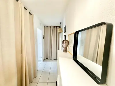 Télévision ou salle de divertissement dans l'établissement L'Arsène, un cocon avec terrasse