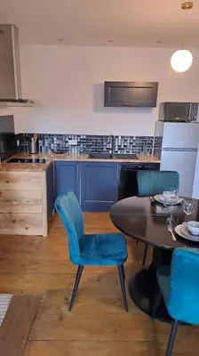Cuisine ou kitchenette dans l'établissement Chez germaine