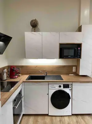 Cuisine ou kitchenette dans l'établissement Logement entier-Clim-100%équipé-Hypercentre-Balcon