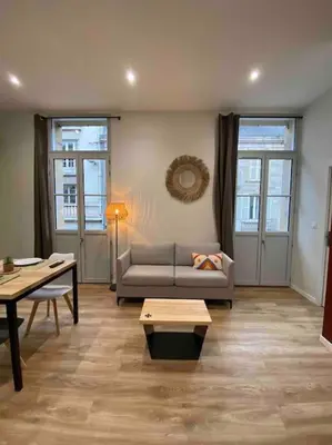 Coin salon dans l'établissement Logement entier-Clim-100%équipé-Hypercentre-Balcon