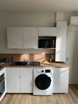 Cuisine ou kitchenette dans l'établissement Appartement hypercentre 100% équipé *Clim*