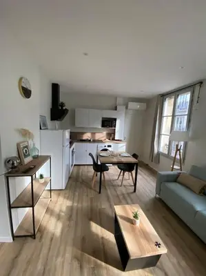 Coin salon dans l'établissement Appartement hypercentre 100% équipé *Clim*