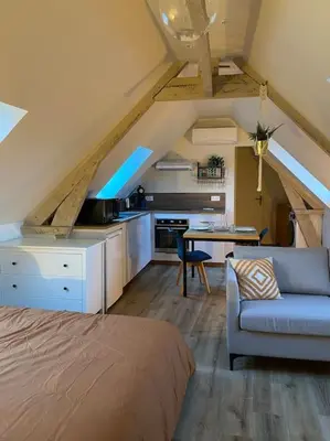 Coin salon dans l'établissement Appartement chaleureux - Clim réversible - Meublé A-Z