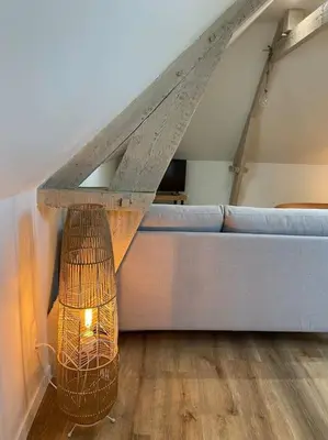 Coin salon dans l'établissement Appartement chaleureux - Clim réversible - Meublé A-Z