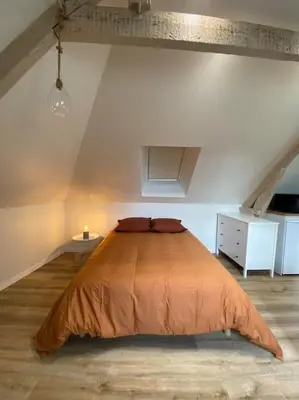 Un ou plusieurs lits dans un hébergement de l'établissement Appartement chaleureux - Clim réversible - Meublé A-Z