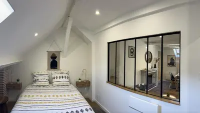 Un ou plusieurs lits dans un hébergement de l'établissement Appartement Design & Calme - Au centre de Tulle!