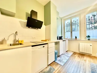 Cuisine ou kitchenette dans l'établissement Le Général, optimal et central