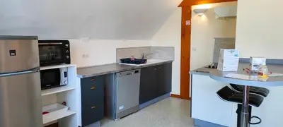 Cuisine ou kitchenette dans l'établissement Gîte 3 étoiles - Spacieux et confortable ancienne grange rénovée - Cantal Emotions Valette - Auvergne
