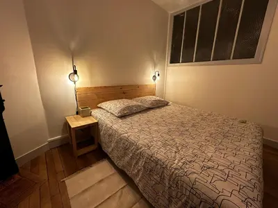 Un ou plusieurs lits dans un hébergement de l'établissement Belle maison de ville au cœur du village de montagne