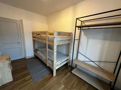Un ou plusieurs lits dans un hébergement de l'établissement Belle maison de ville au cœur du village de montagne