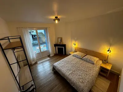 Un ou plusieurs lits dans un hébergement de l'établissement Belle maison de ville au cœur du village de montagne