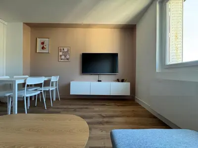 Télévision ou salle de divertissement dans l'établissement La pause Tulliste