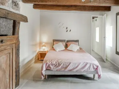 Un ou plusieurs lits dans un hébergement de l'établissement Beautiful holiday home with pool in Teillots