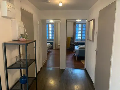 Un ou plusieurs lits dans un hébergement de l'établissement La Maison aux Volets Bleus 2ème Étage