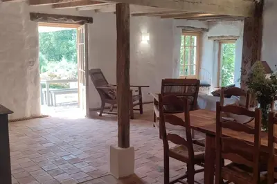 Coin salon dans l'établissement Le cottage des Acacias
